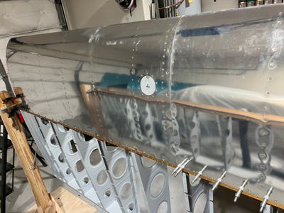 Riveting the leading edge to the main spar