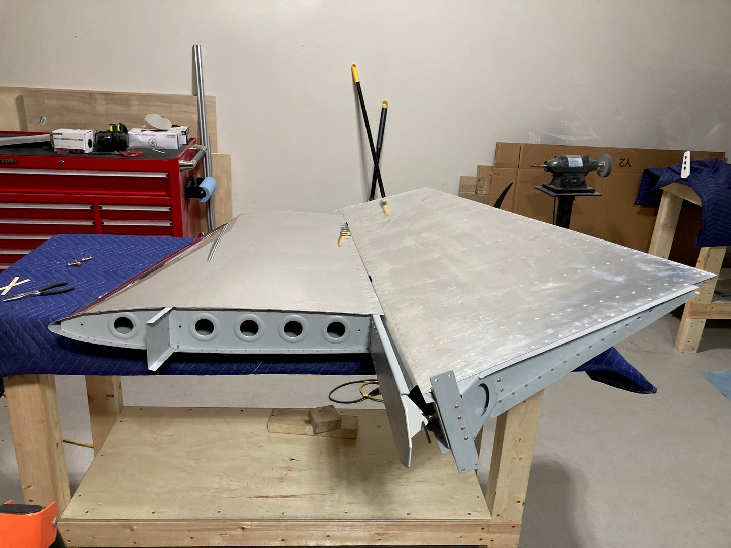 The rudder temporarily hanging on the vertical stabilizer.