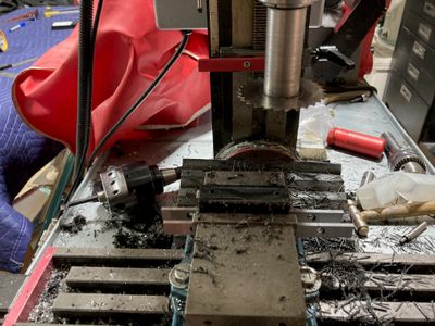 Using the slitting saw to split the center block.