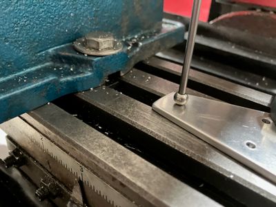 Aligning the spindle to the hole.