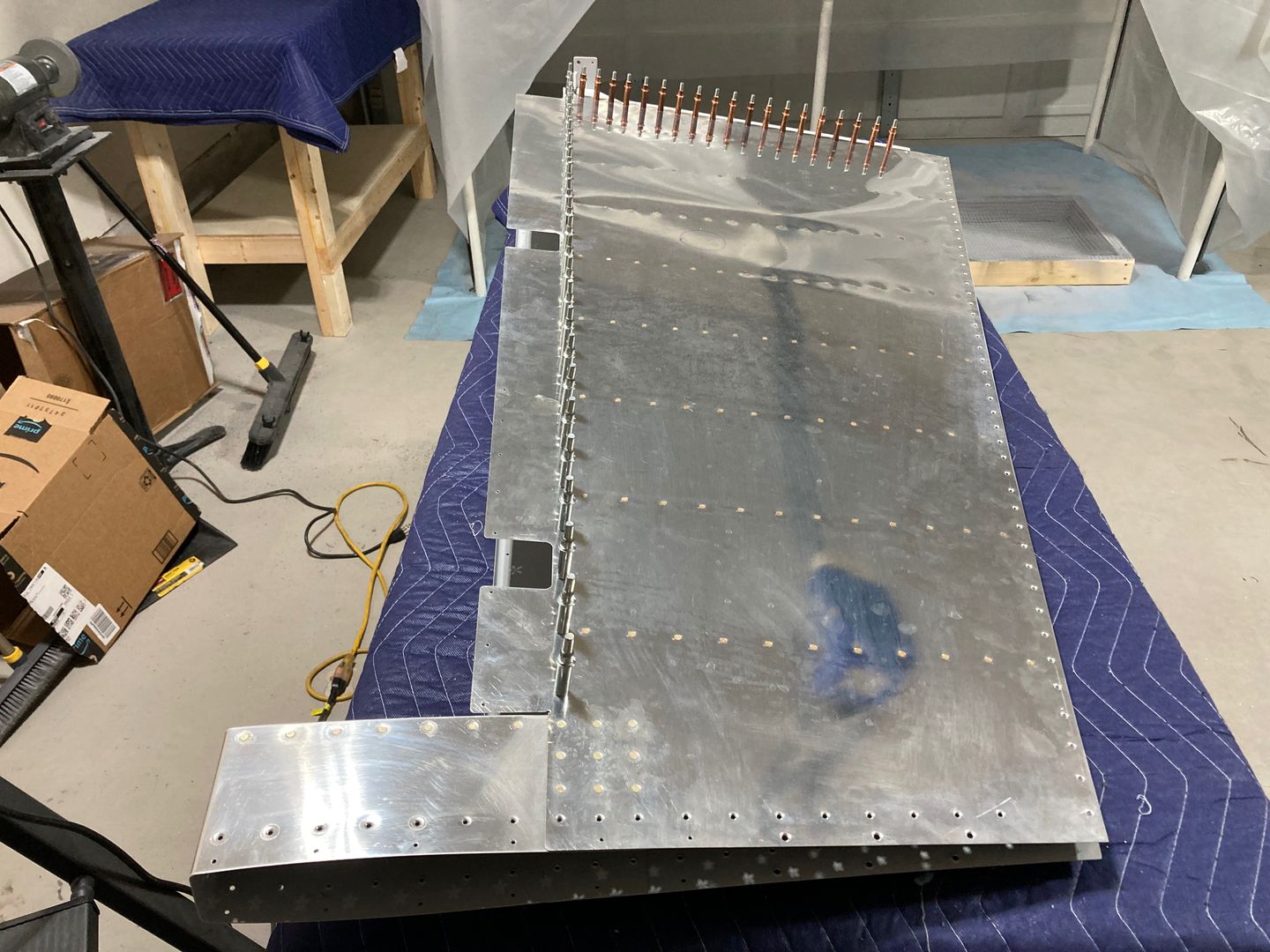 The rudder is partially riveted.